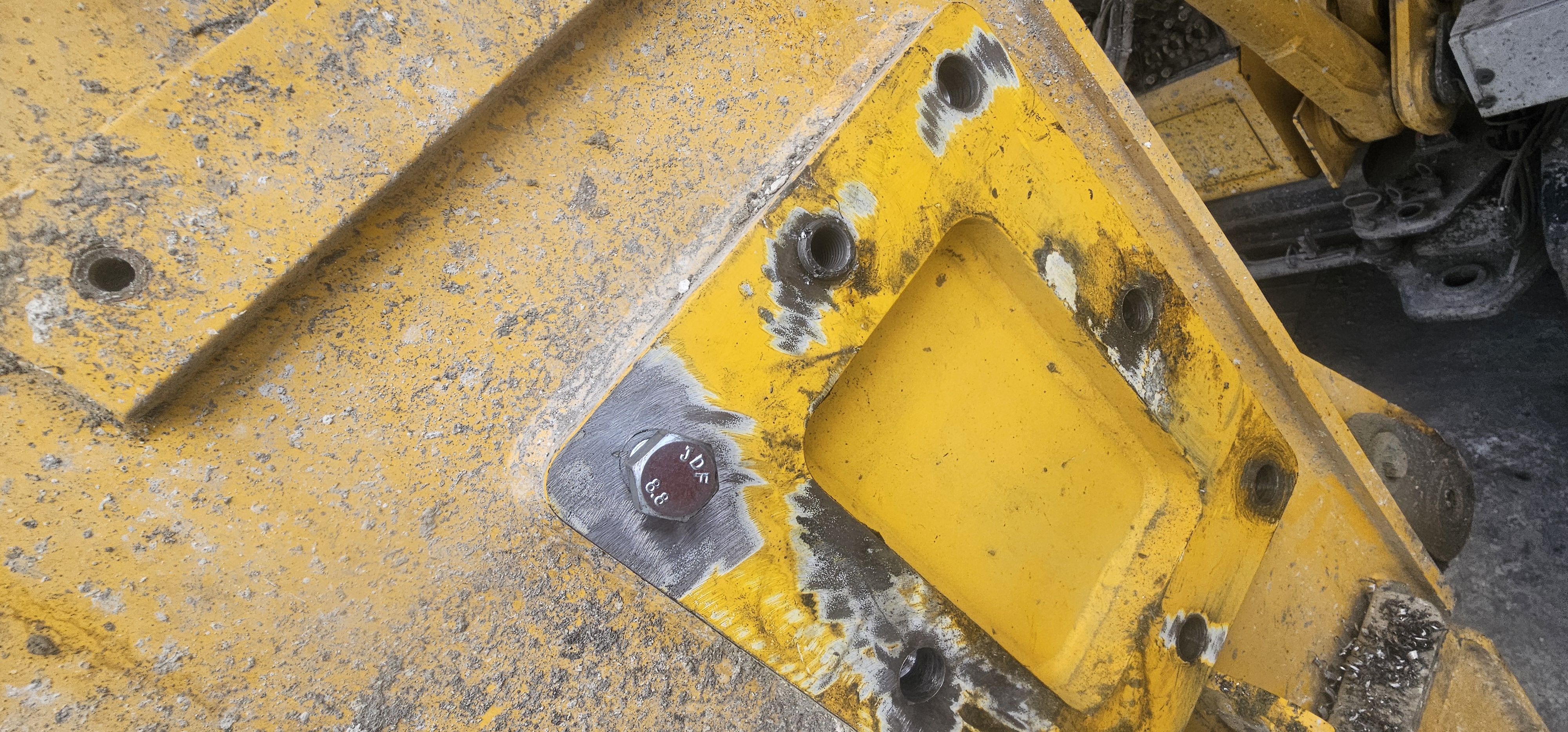 Auger cleaner mounting pad re-machined with bolts trial fitted