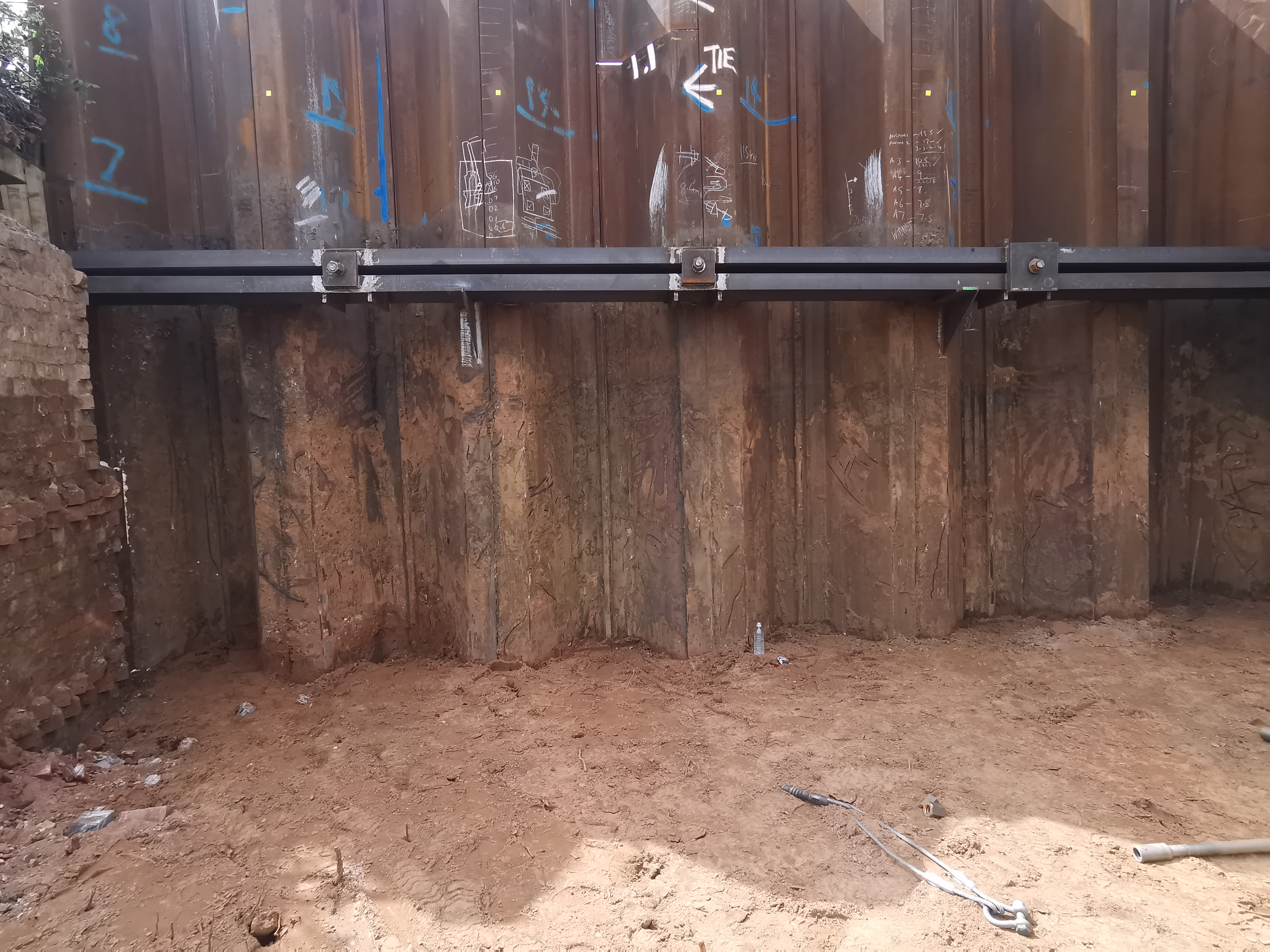 Welded beams and anchor plates securing the abutment face