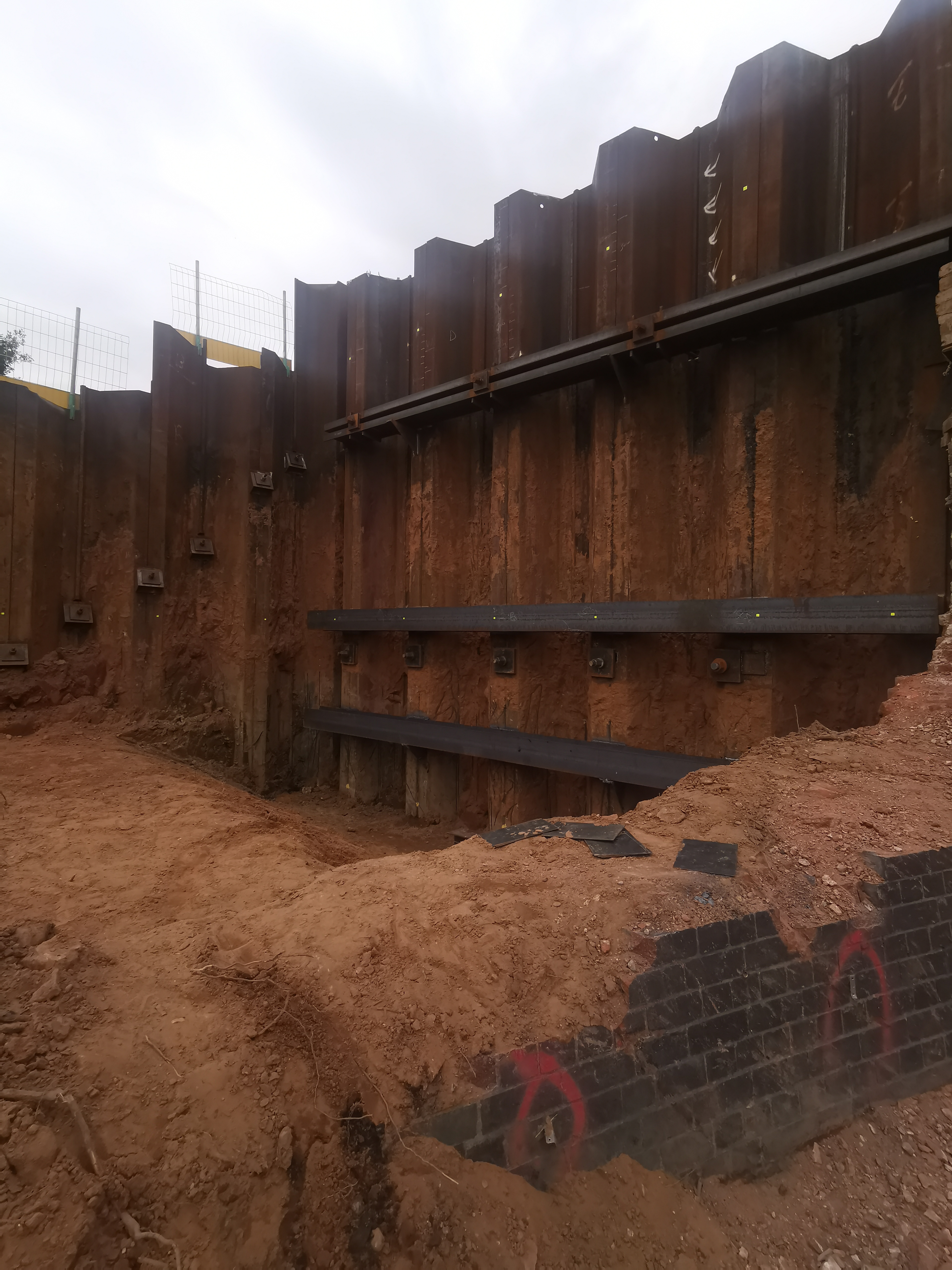 Final check of tie-back hardware before the next stage