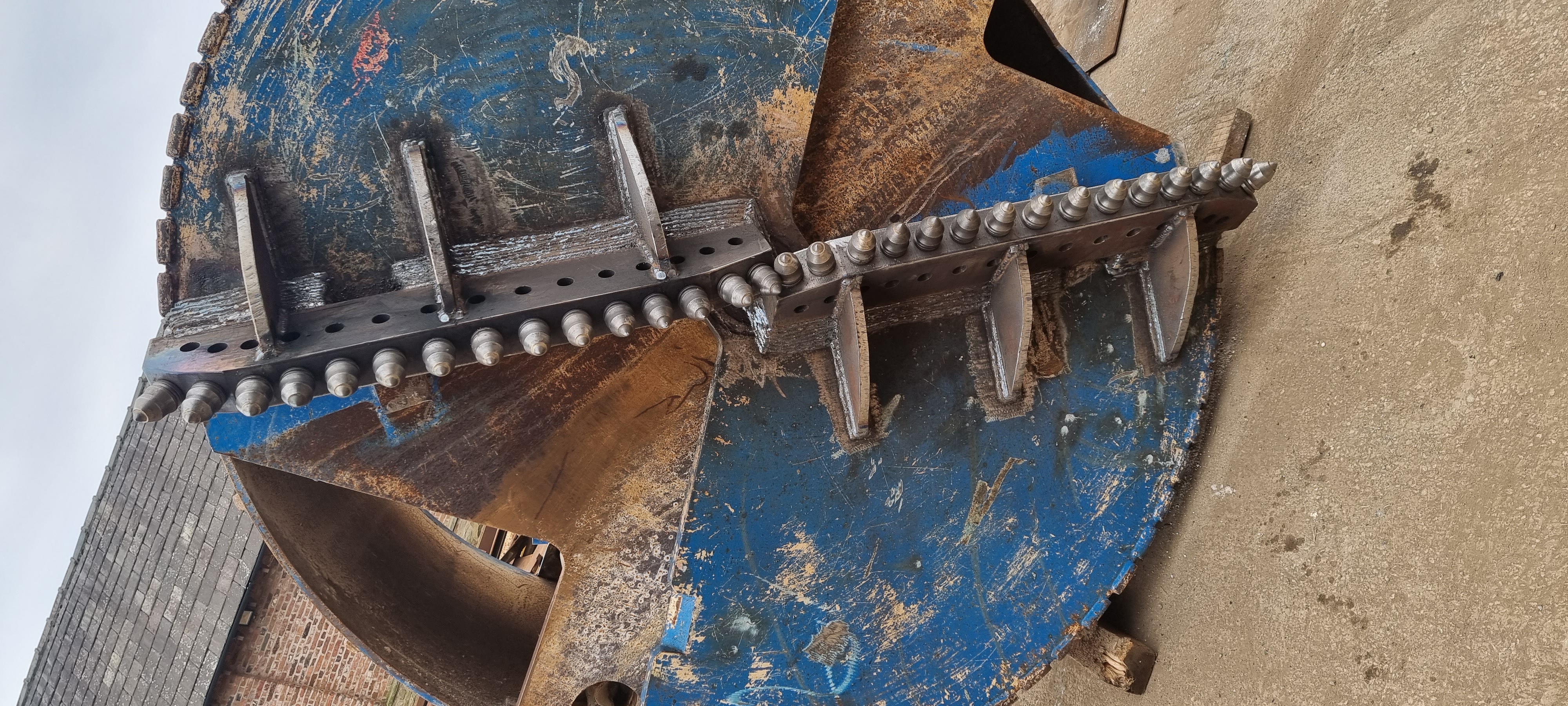 Large diameter bucket rebuilt with new teeth and ledger blocks