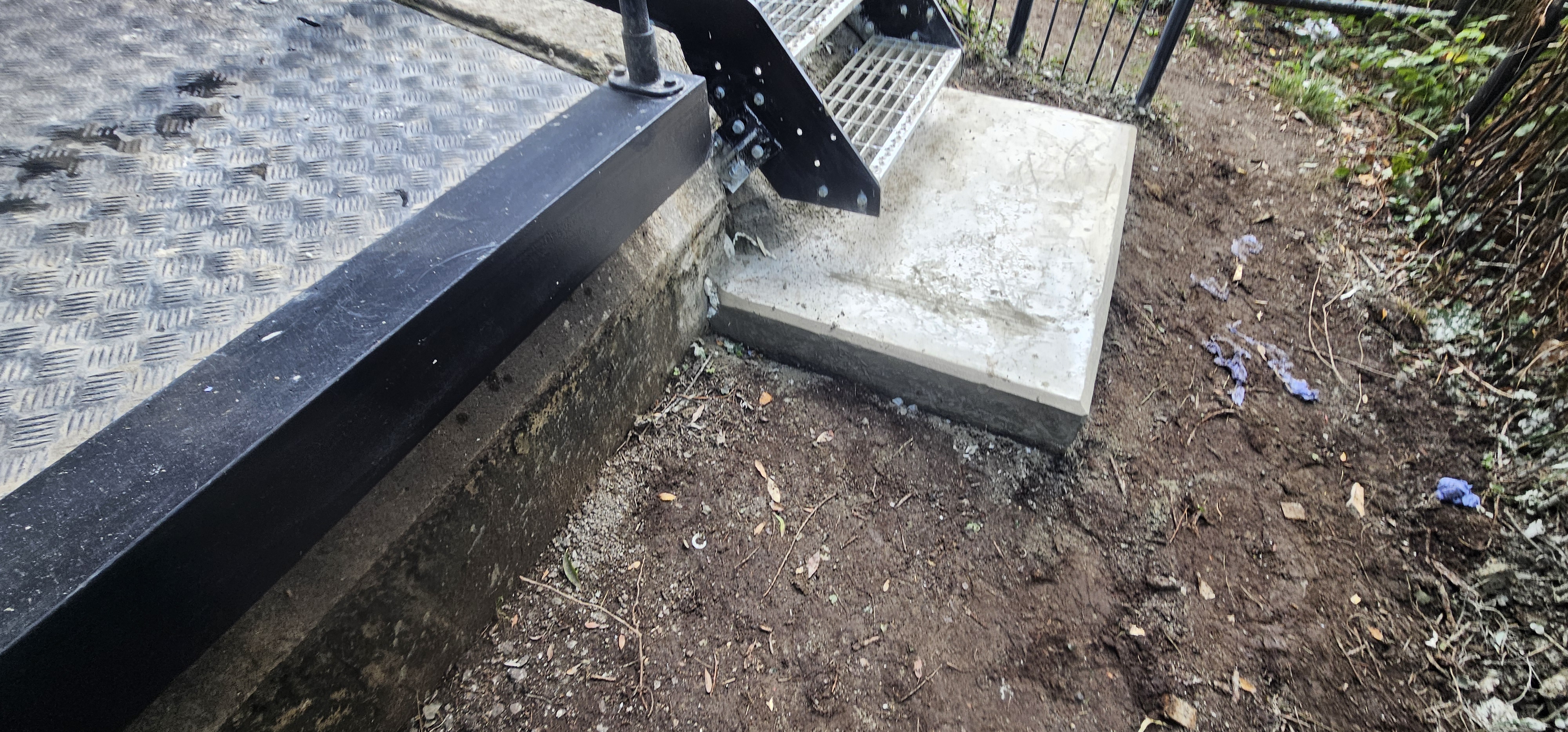 New concrete pad formed for stair landing